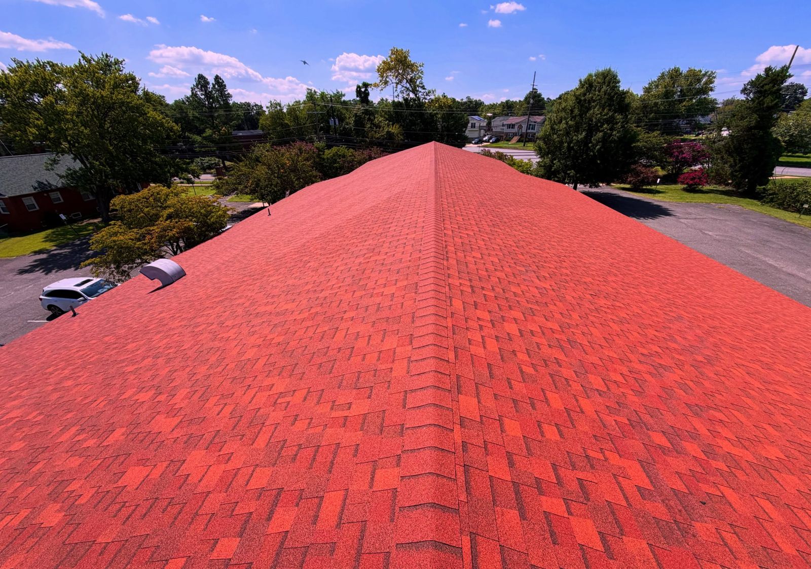 Looking down the ridge of the finished terra cotta roof